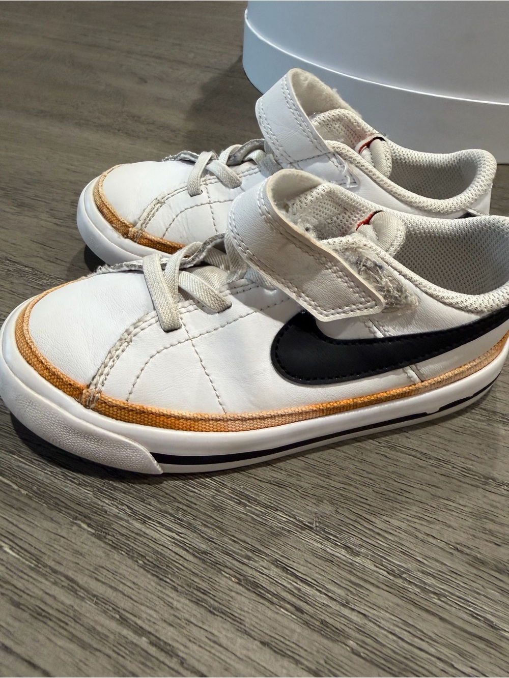 Nike Kids White Sneakers with Black Swoosh and Tan Trim